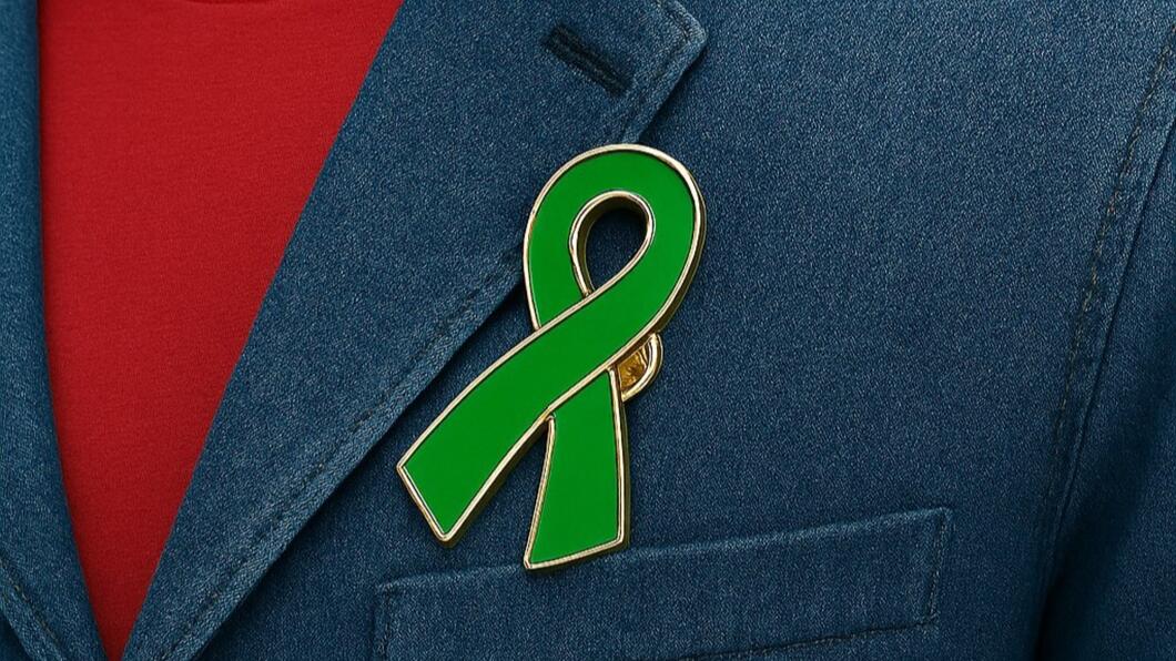 groene lintje opgespeld