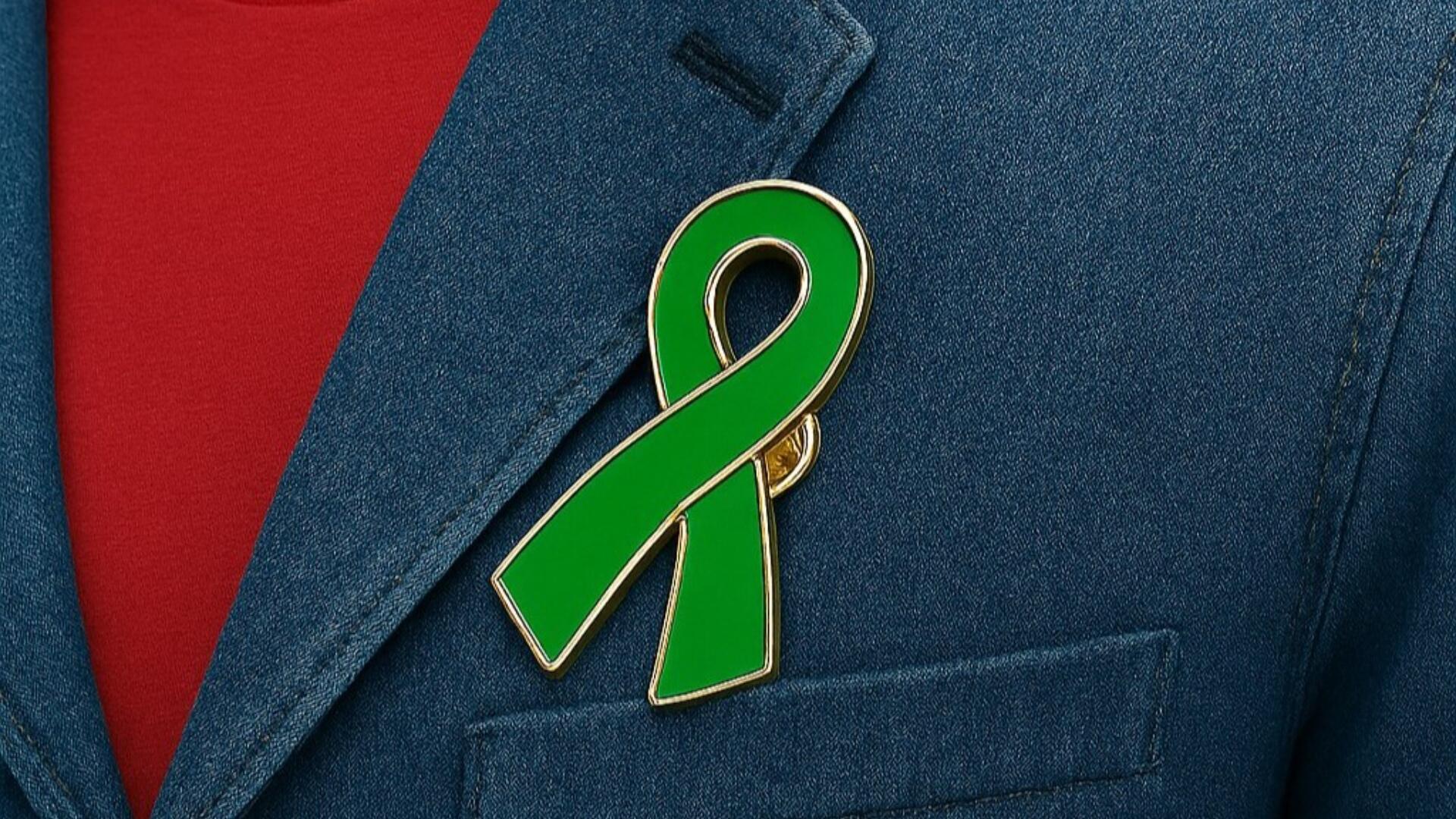 groene lintje opgespeld